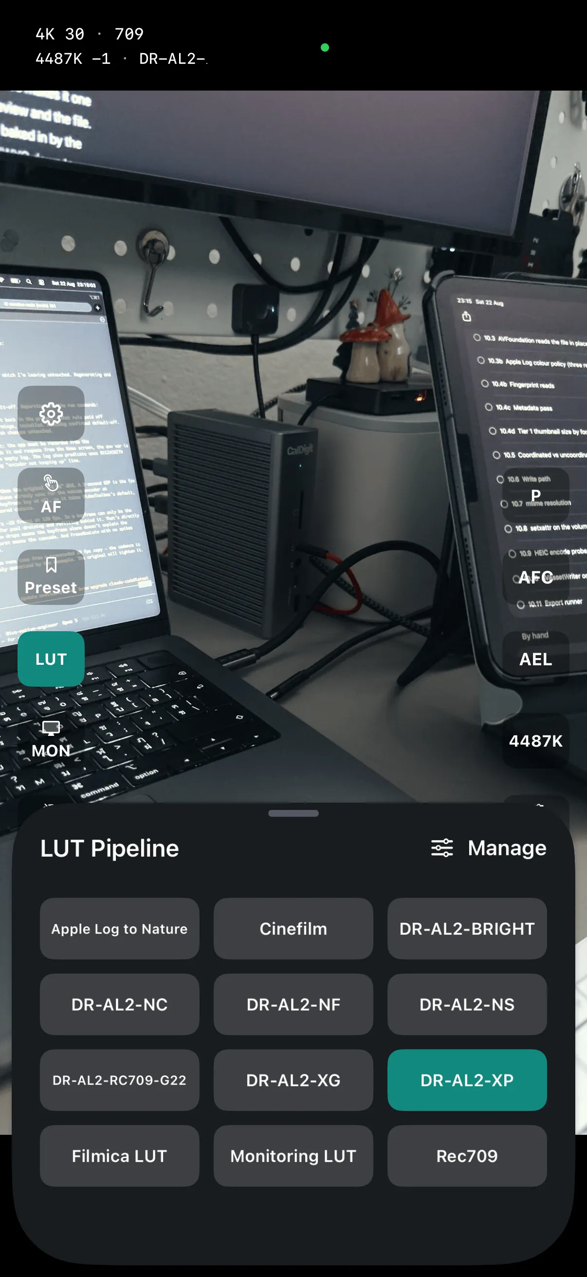 The LUT Pipeline sheet over the live preview: bundled and imported looks as tappable tiles, with DR-AL2-XP selected
